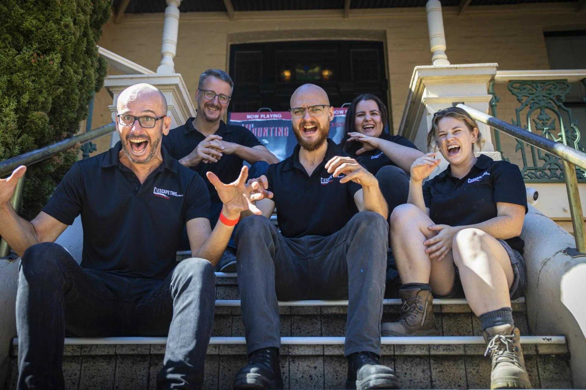 The Escape This crew pulling faces on the steps of Escape This Northbridge